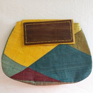 Multi color clutch from Mad Imports with large wood clasp